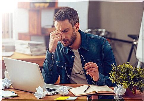 Types of procrastination: A man who works hard on his computer