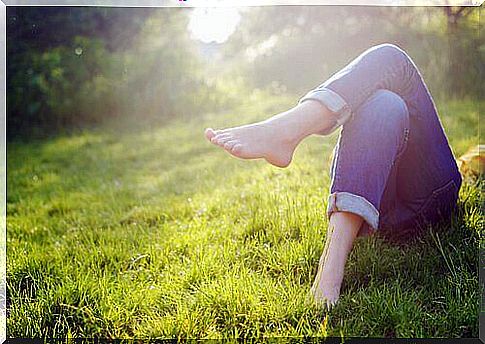 Person relaxes in the grass