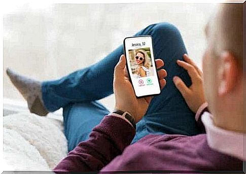 A person looking at a dating app.