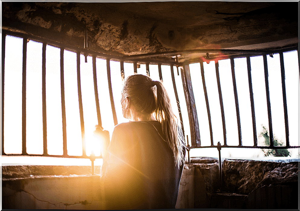 Caught woman watching the sunrise