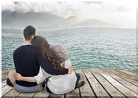 Couple looking out to sea.