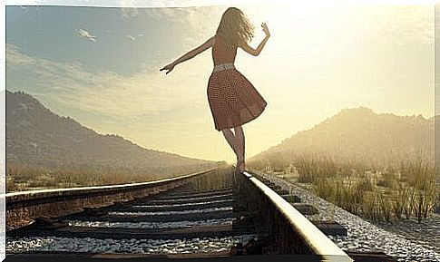 Girl on train track