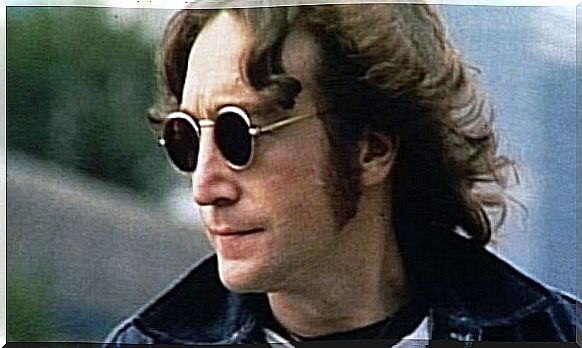 John Lennon with dark glasses.