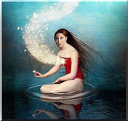 woman in water with fire heart