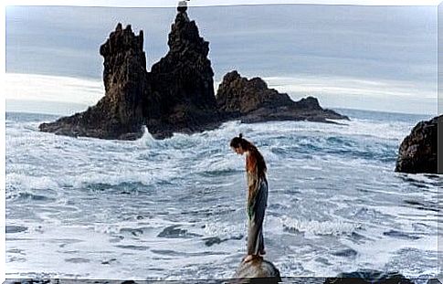 Woman by the sea.