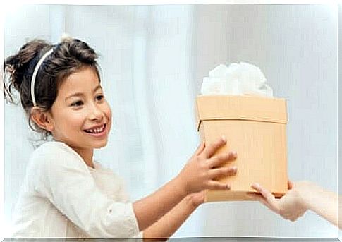 Girl receiving a gift.